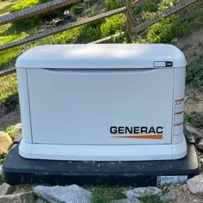 16kw generac generator - installed by synergy power systems in central and souteastern pa - 02 A Generac Guardian series 16 kW whole home generator installed along the side of a residential home in PA, offering a powerful and efficient source of backup power during outages.