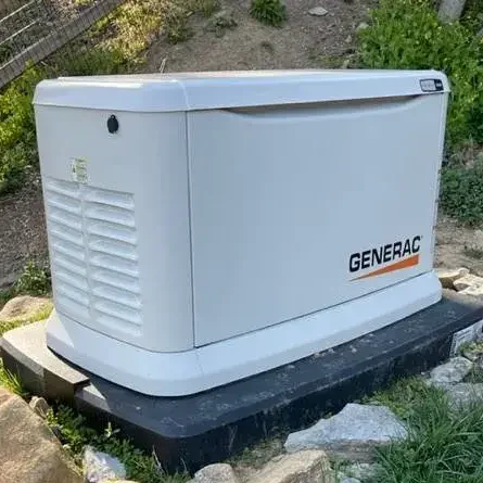 18kw generac generator - installed by synergy power systems in central and souteastern pa - 03 A Generac Guardian series 18 kW whole home generator installed along the side of a residential home in southeastern and central PA, offering a powerful and efficient source of backup power during outages.